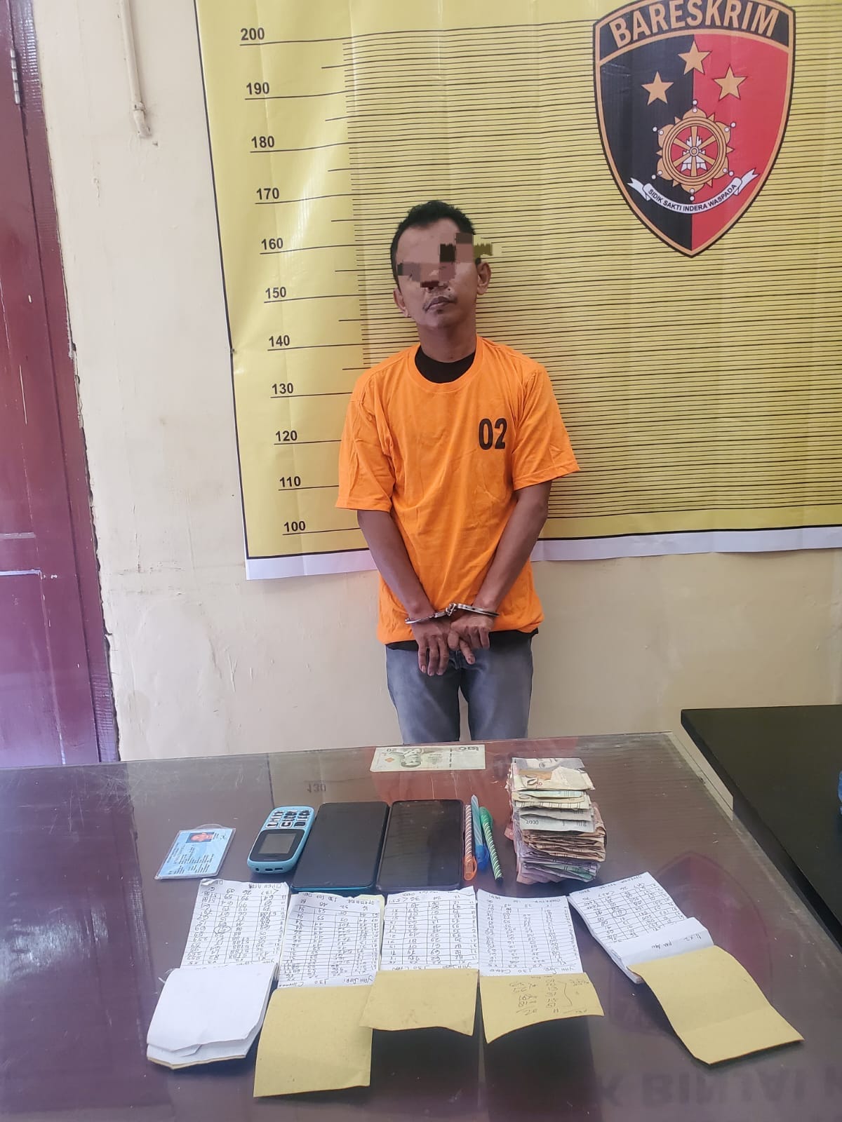 Asik Menulis Hasil Rekapan, Bandar Togel Dibekuk Polres Binjai